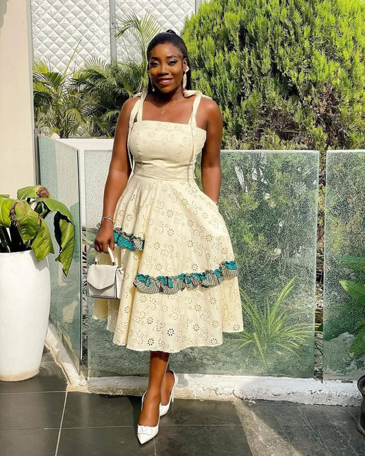 Elegant Eyelet Midi Dress with African Print Trim