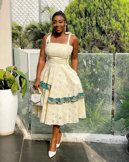 Elegant Eyelet Midi Dress with African Print Trim