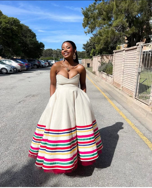 Elegant Rainbow Striped Strapless Maxi Dress with Matching Cape